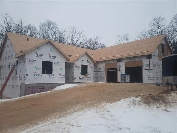 Local storm damage roof repair after storm damage in Oxford, WI by K & S Builders of Wisconsin Dells