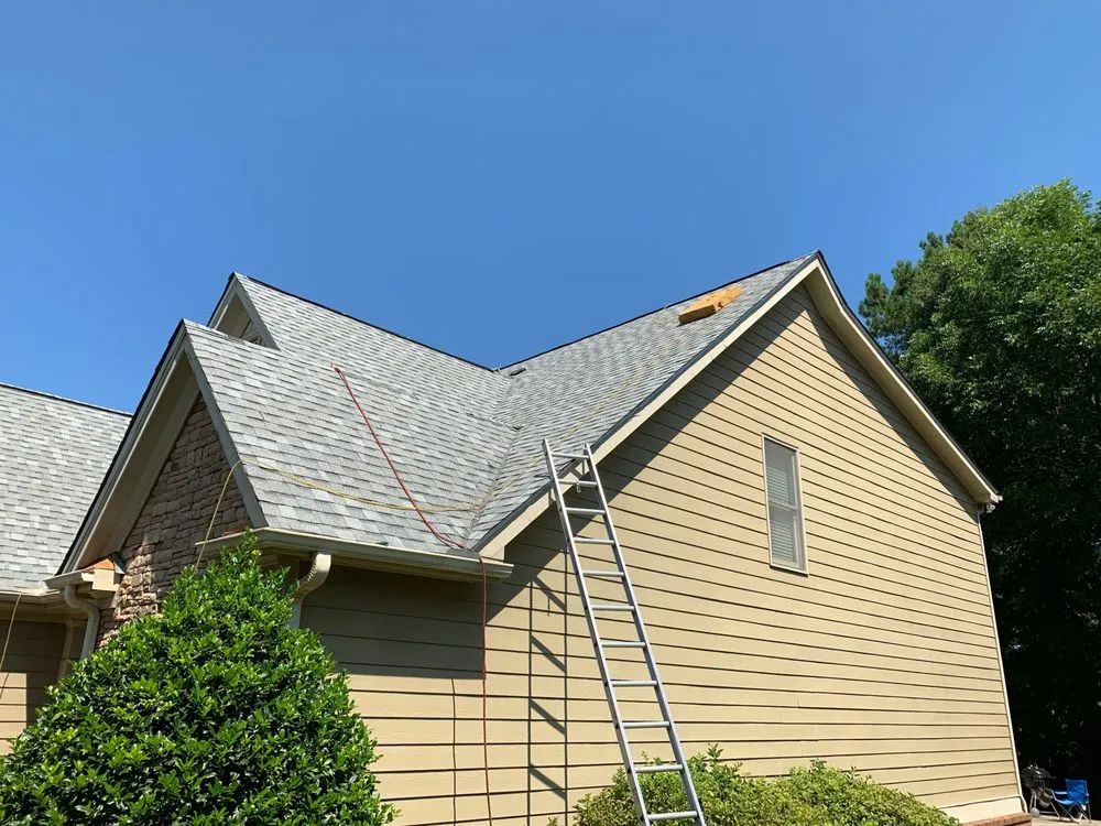 Slide of K and R Roofing