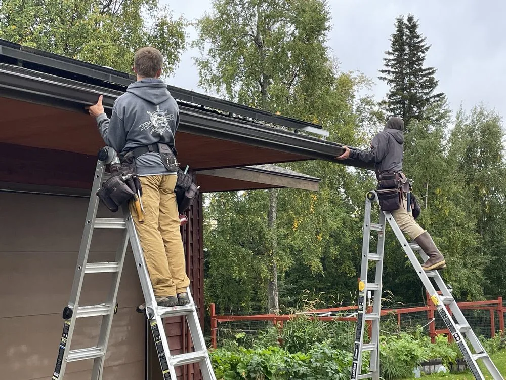 Slide of K-Bay Roofing