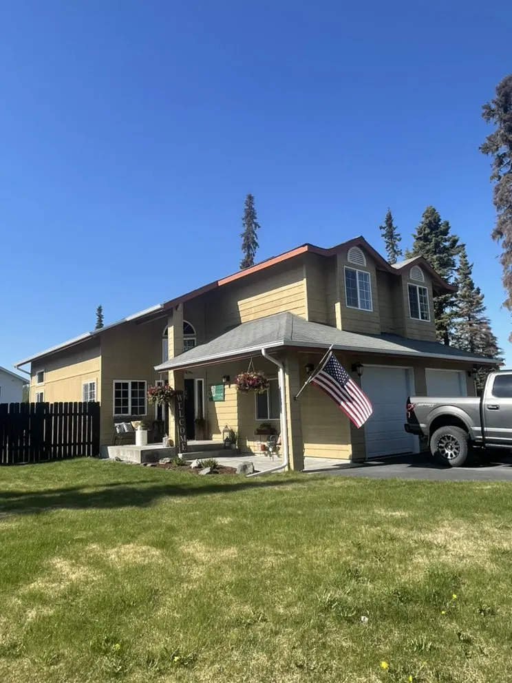 Slide of K-Bay Roofing