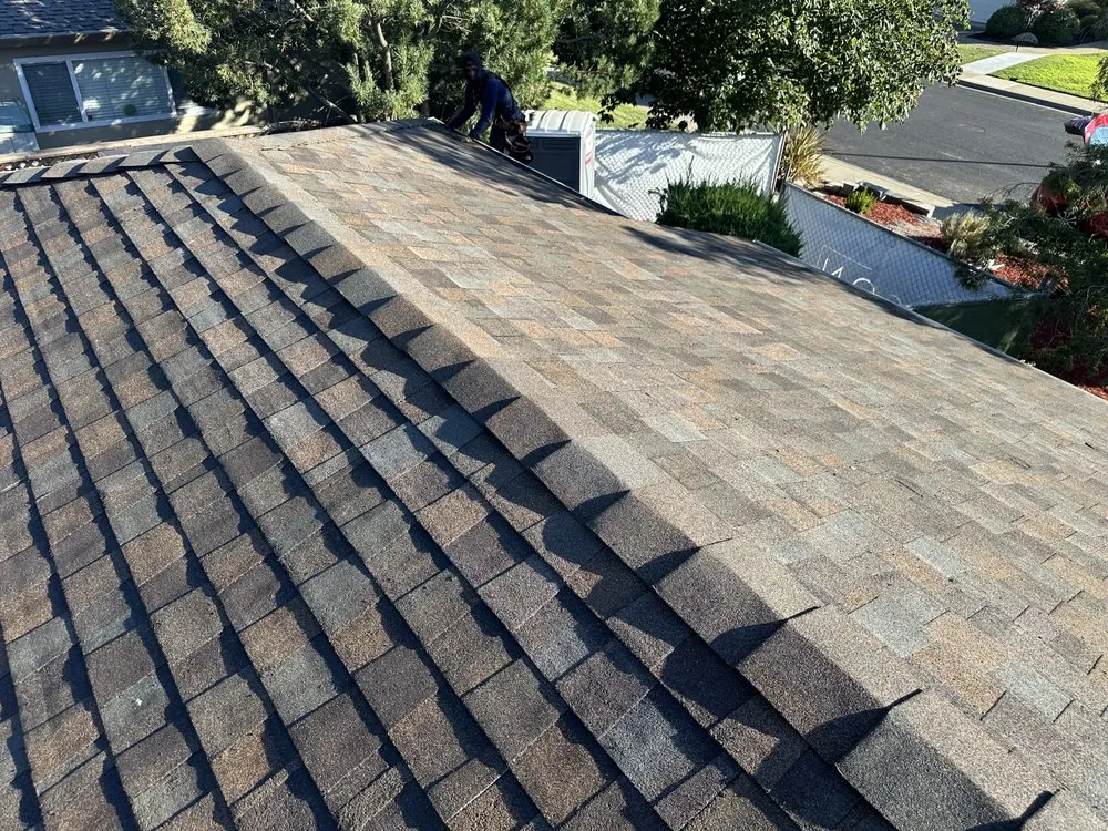 Slide of Kadosh Roofing