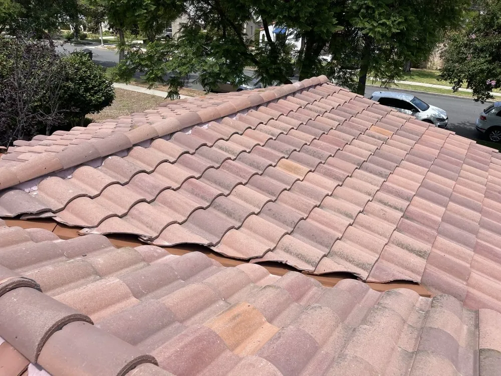 Slide of Kaliber Roofing