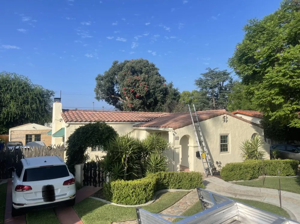 Slide of Kaliber Roofing