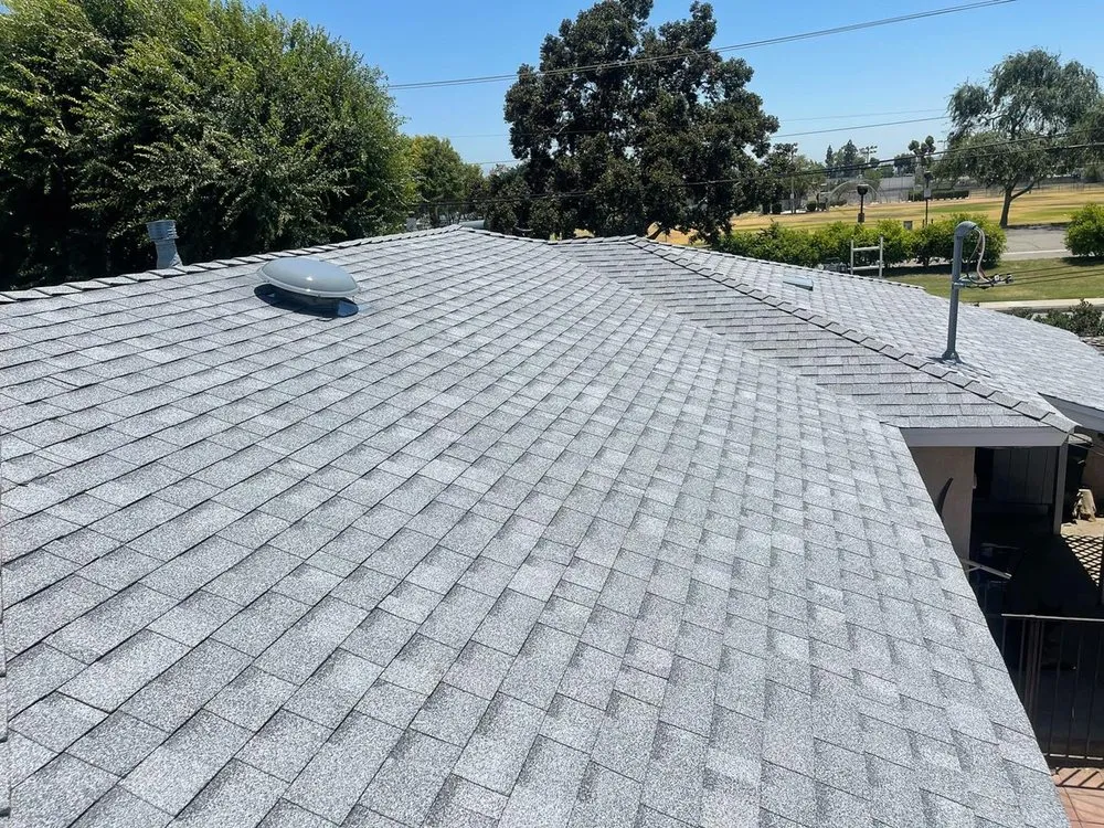 Slide of Kaliber Roofing