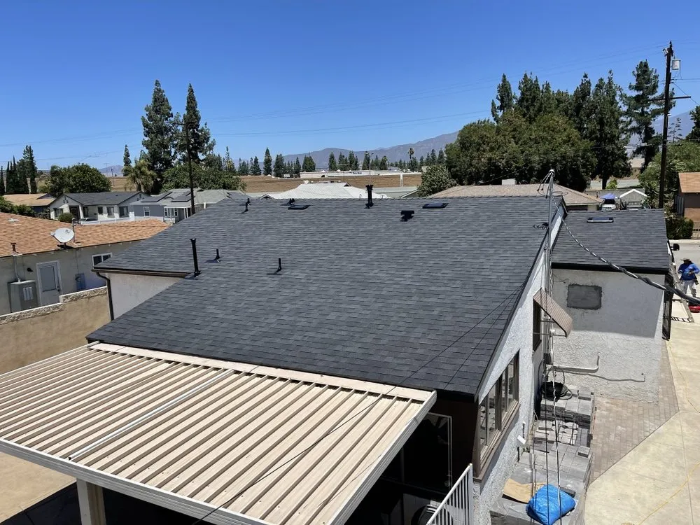 Slide of Kaliber Roofing