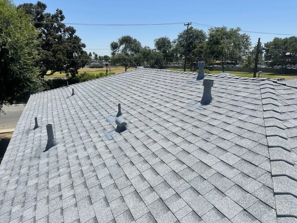 Slide of Kaliber Roofing