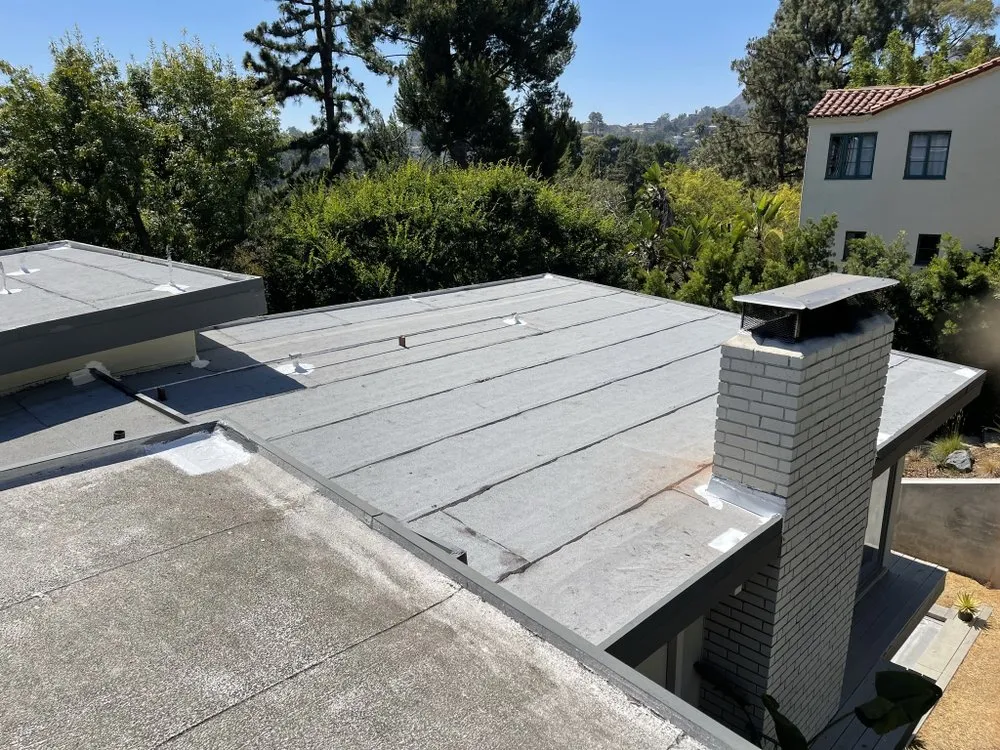 Slide of Kaliber Roofing