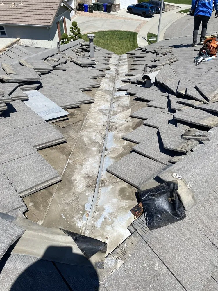 Slide of Kaliber Roofing