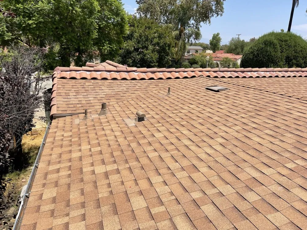 Slide of Kaliber Roofing