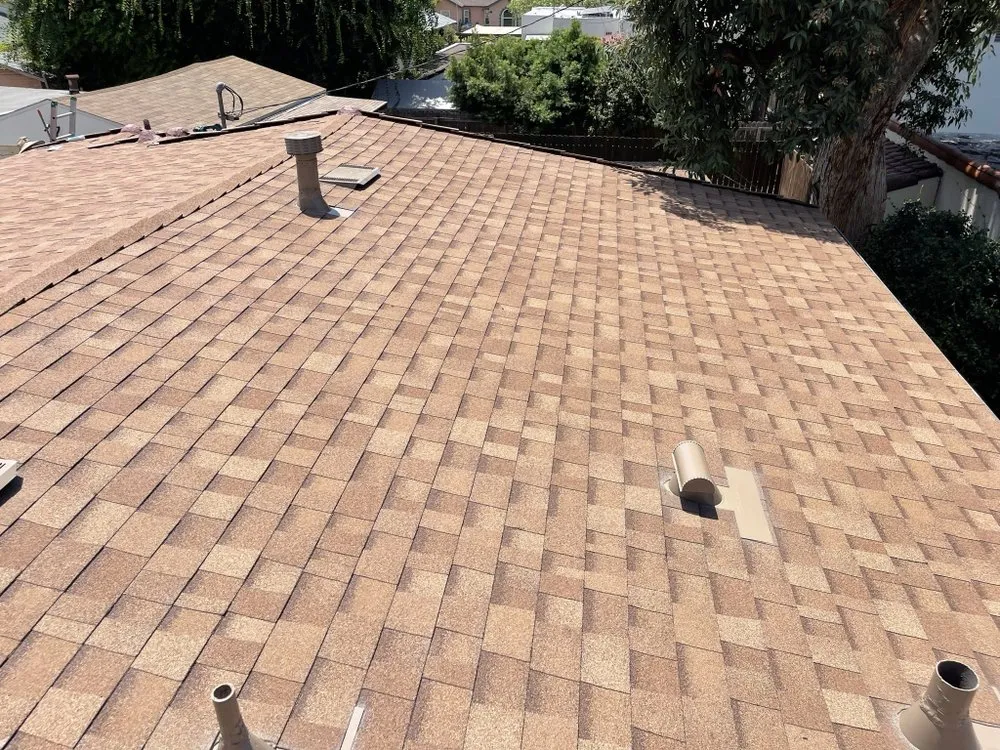 Slide of Kaliber Roofing