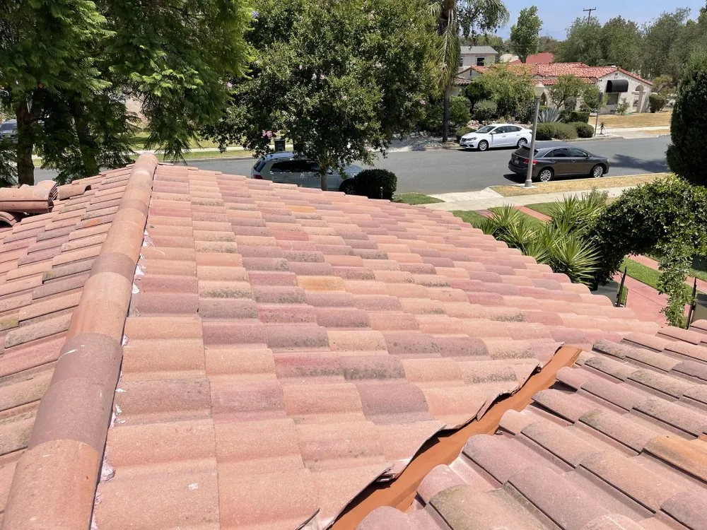 Slide of Kaliber Roofing