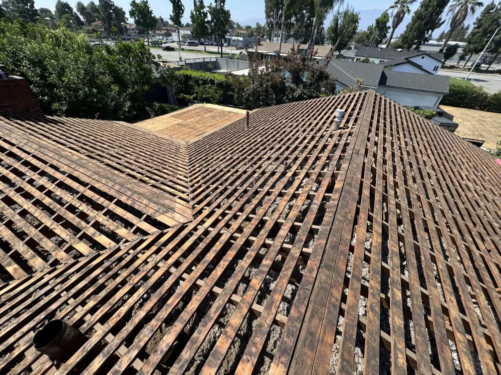 Slide of Kaliber Roofing