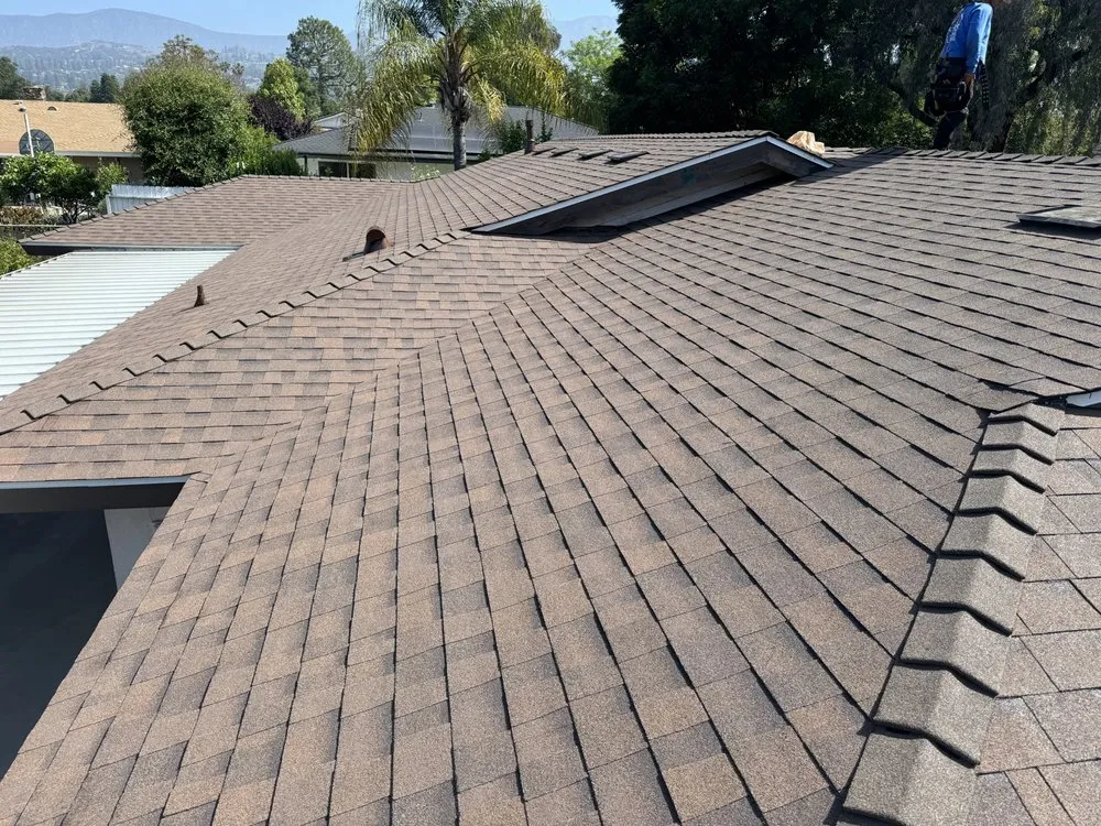 Slide of Kaliber Roofing