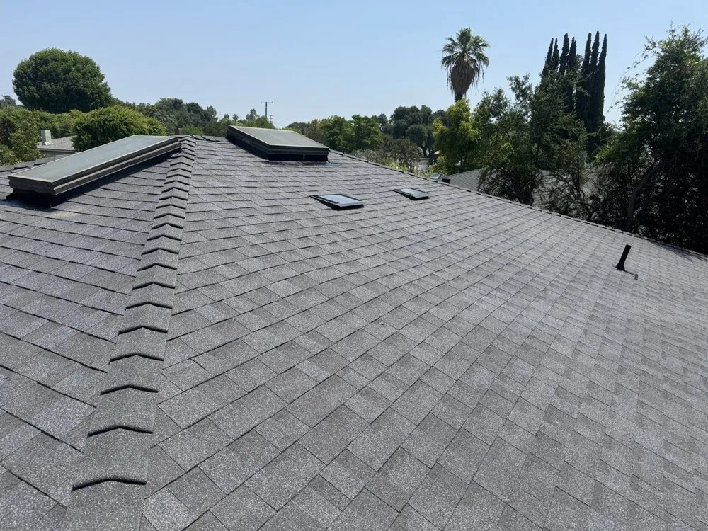 Slide of Kaliber Roofing