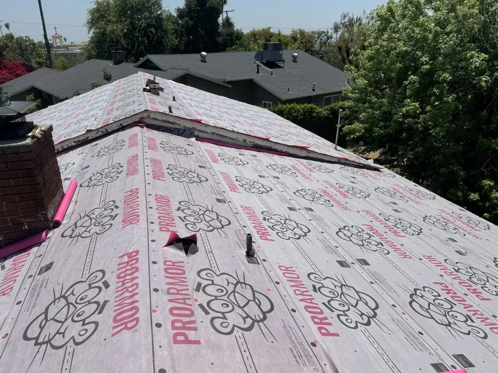 Slide of Kaliber Roofing