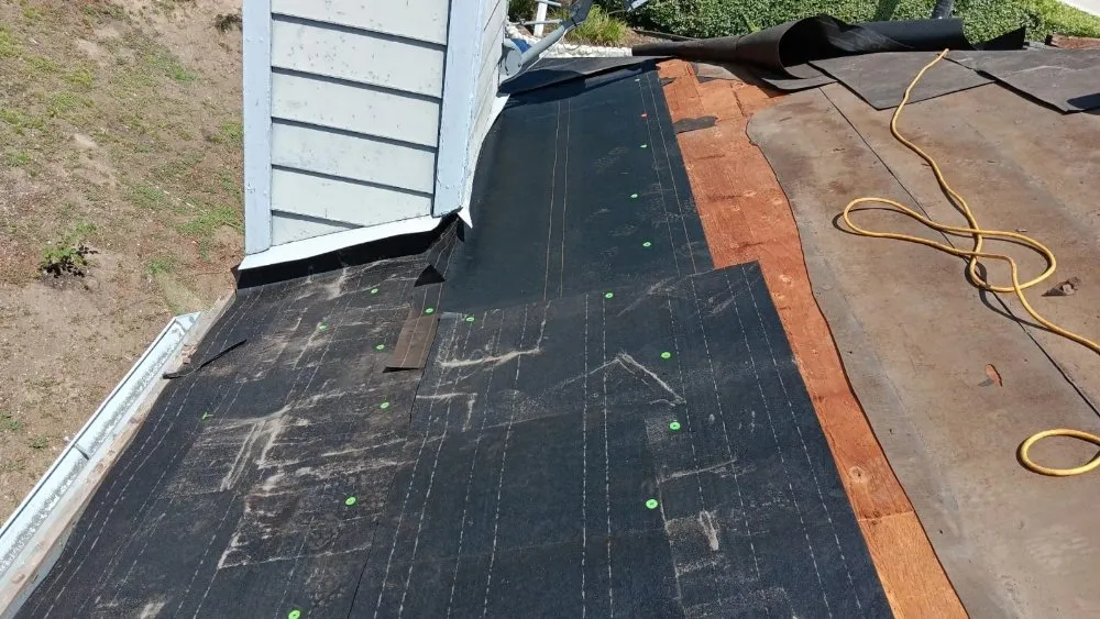 Slide of Kalli Roofing