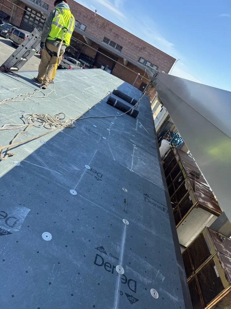 Slide of Kamberi NYC Construction