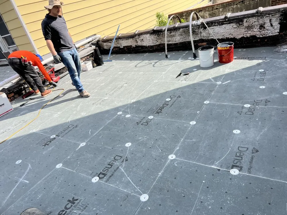 Slide of Kamberi NYC Construction