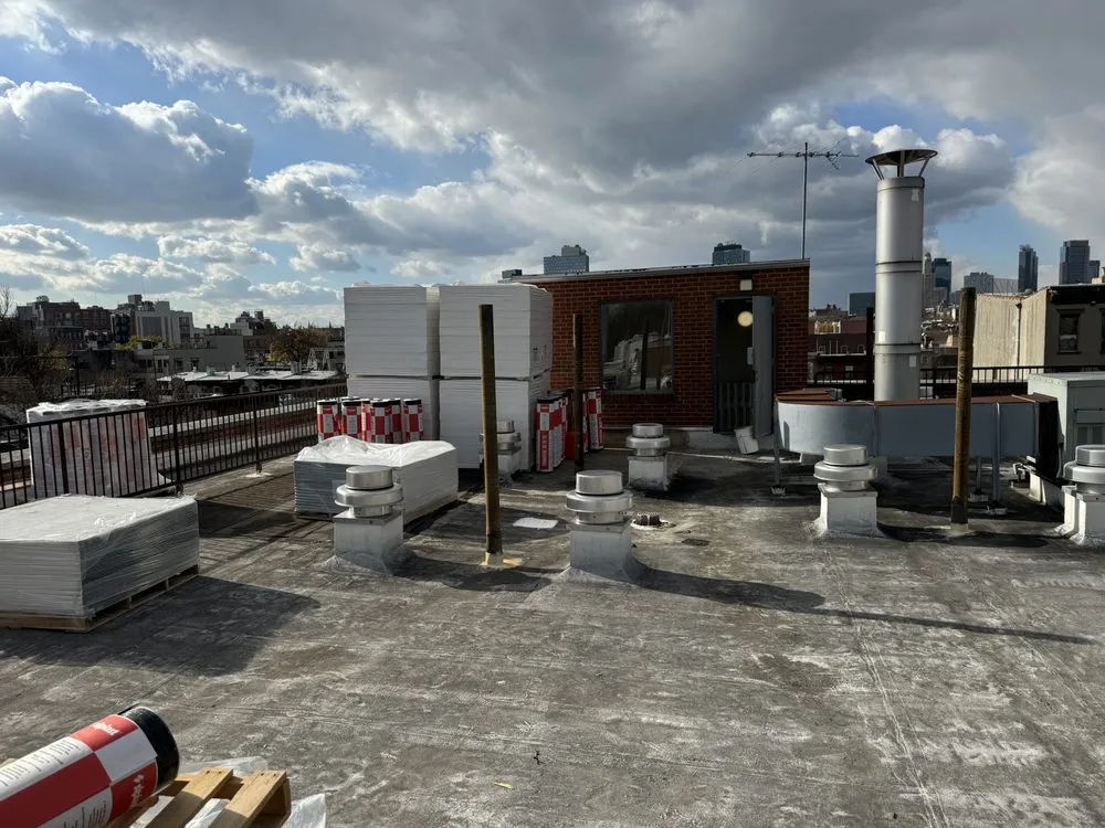 Slide of Kamberi NYC Construction