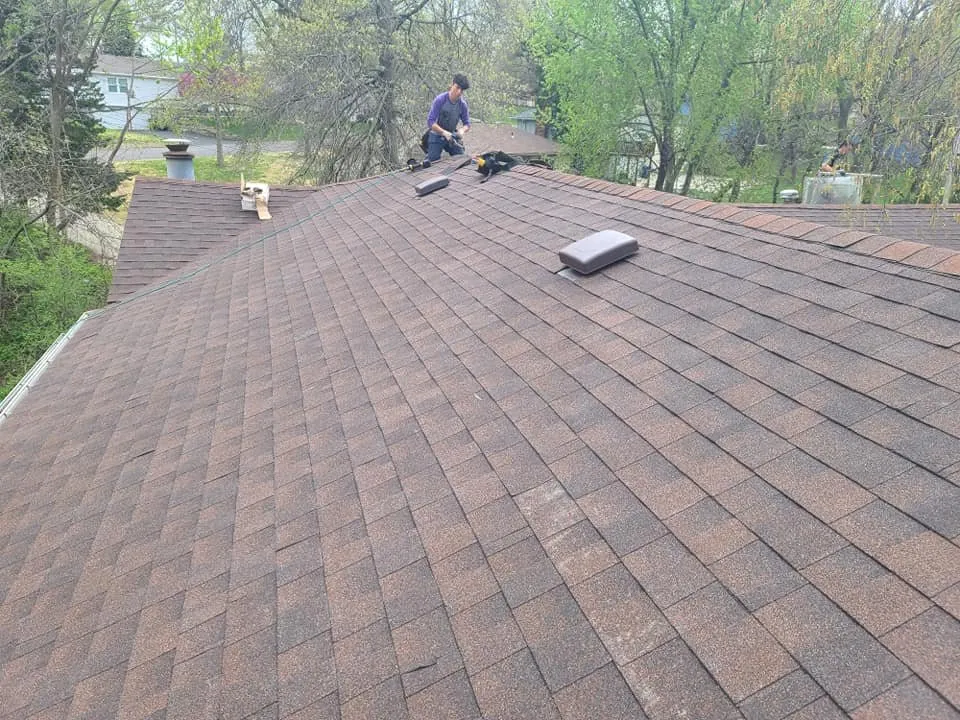 Slide of Kansas City Roofing Company