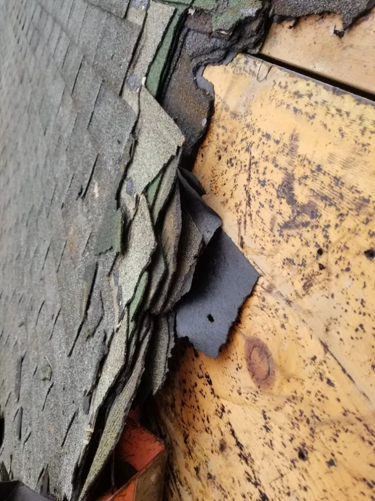 Slide of Kansas City Roofing Company