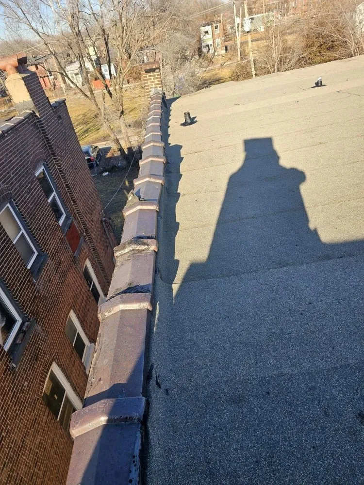 Slide of Kansas City Roofing Company