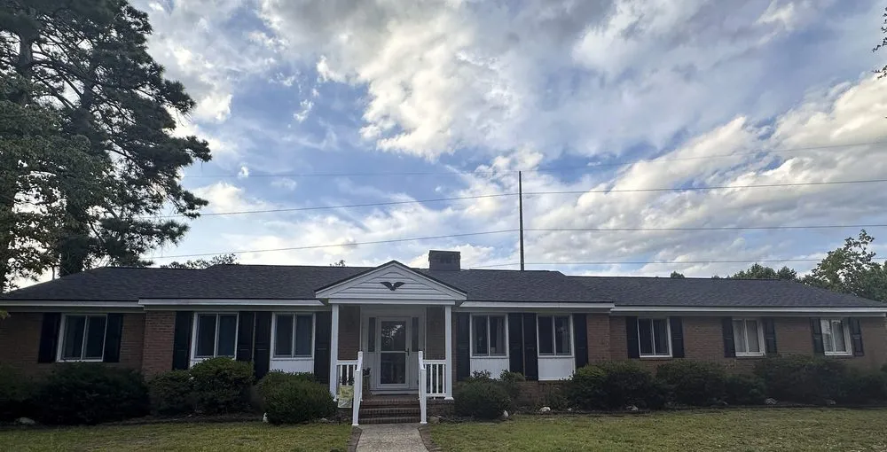 Slide of Karcher Roofing