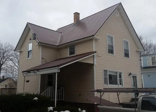 Slide of Kauffman Roofing