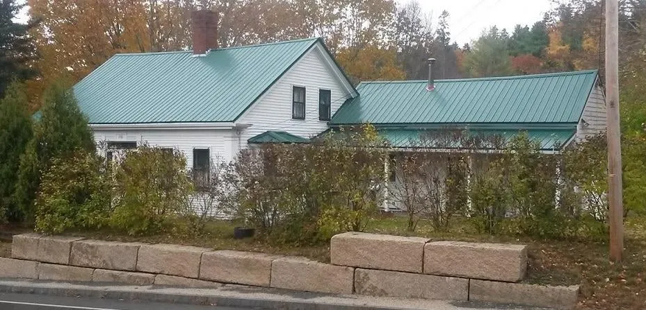 Slide of Kauffman Roofing