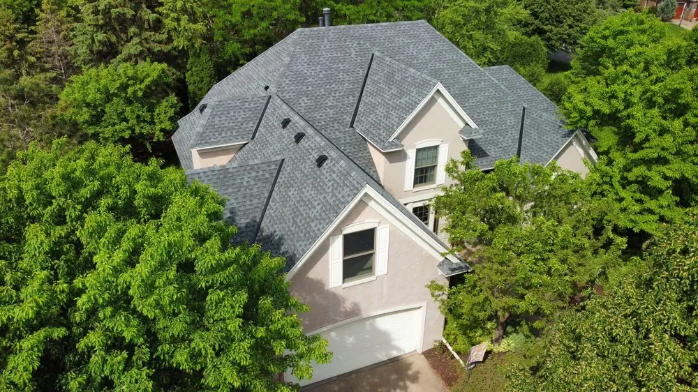 Slide of Kaufman Roofing