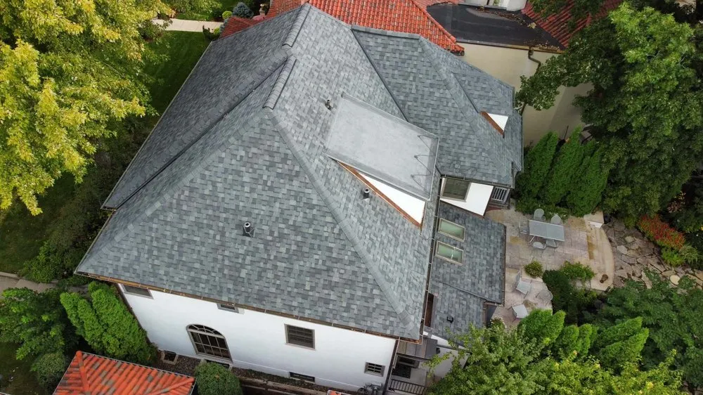 Slide of Kaufman Roofing