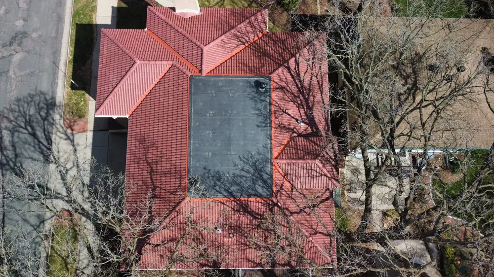 Slide of Kaufman Roofing