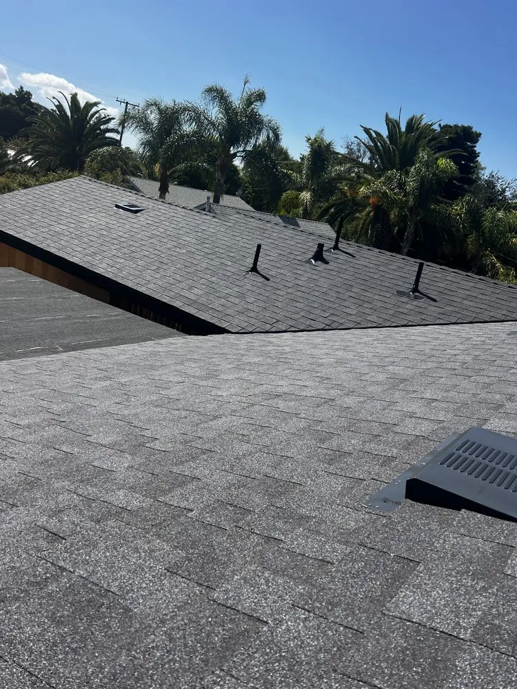 Slide of Kayhan's Roofing