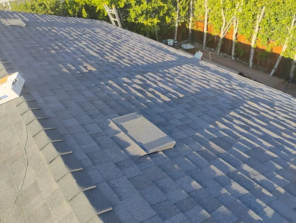 Slide of Kayhan's Roofing