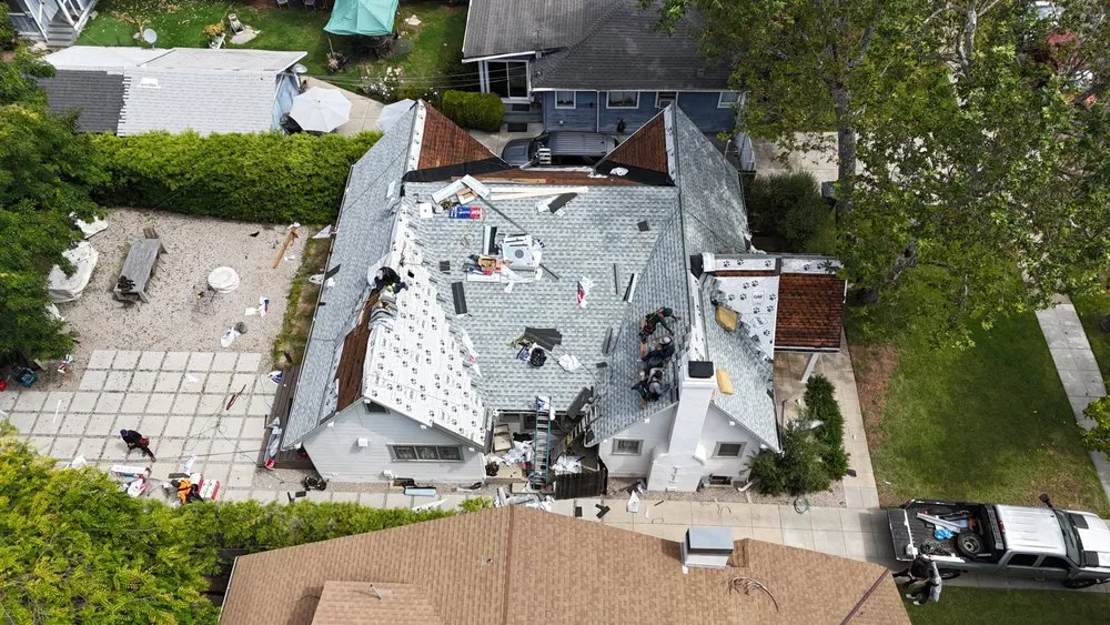 Slide of Kayhan's Roofing