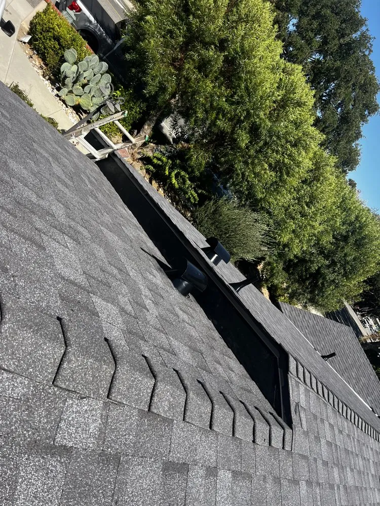 Slide of Kayhan's Roofing