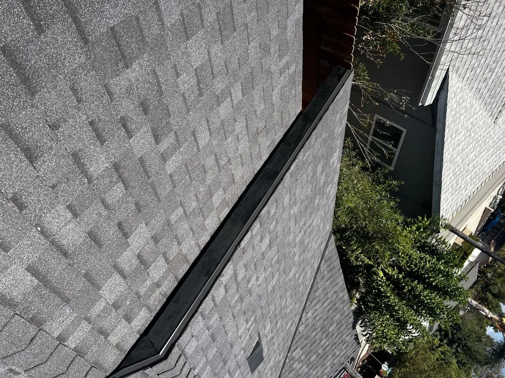 Slide of Kayhan's Roofing