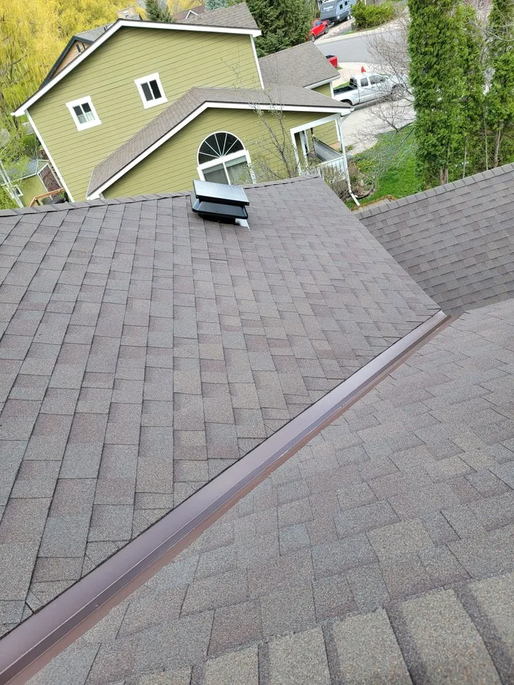 Slide of KAZ Roofing