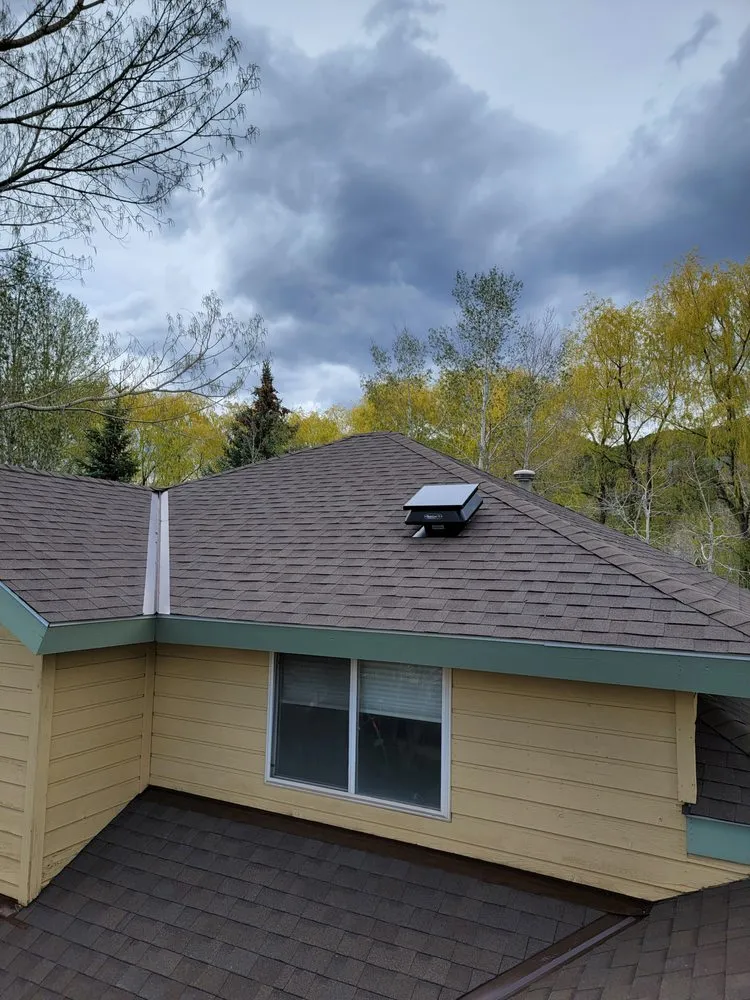 Slide of KAZ Roofing