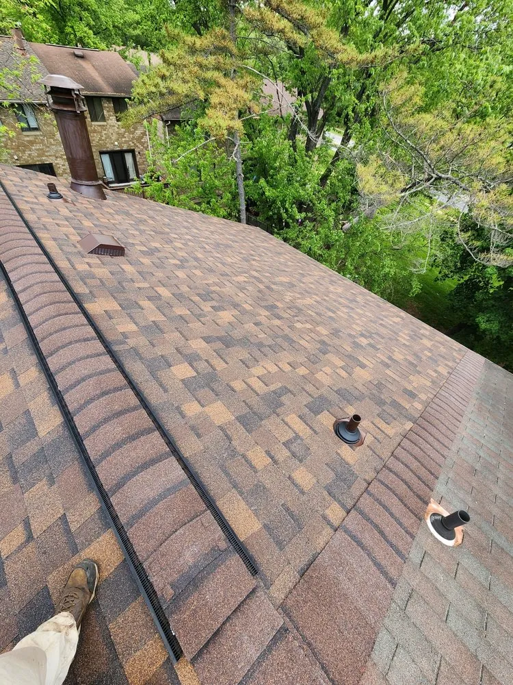 Slide of KC Brothers Roofing