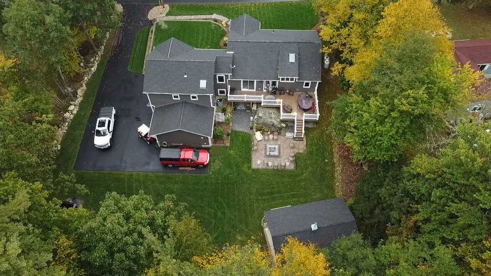 Slide of KC Entities Roofing & Siding