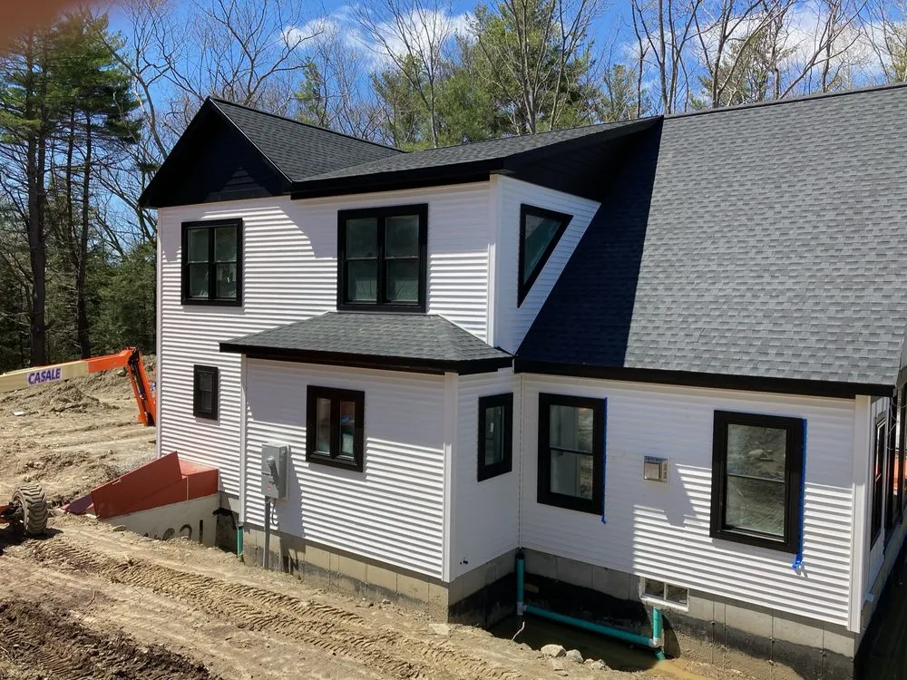 Slide of KC Entities Roofing & Siding