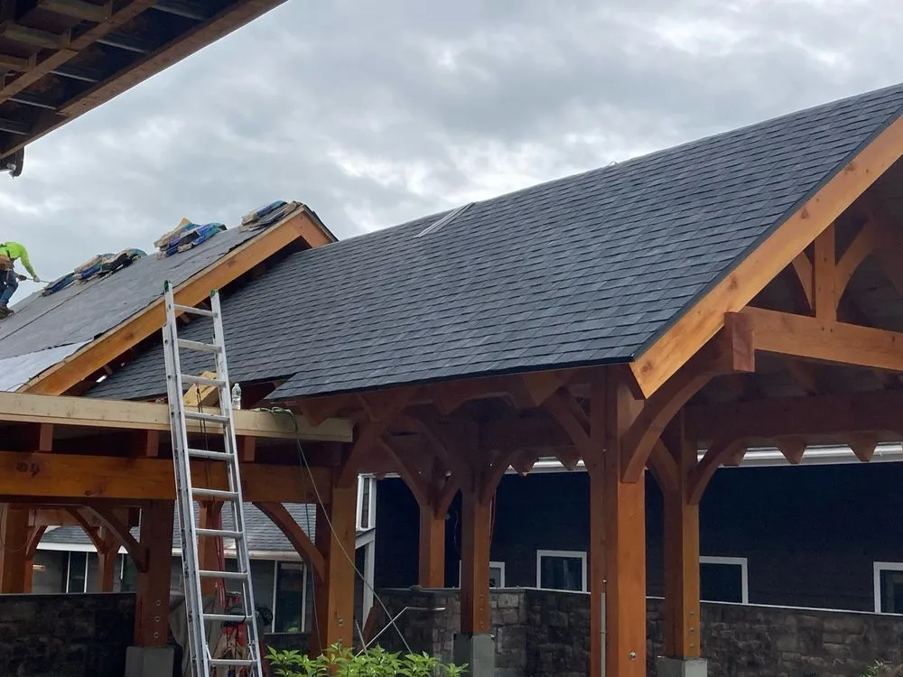 Slide of KC Entities Roofing & Siding