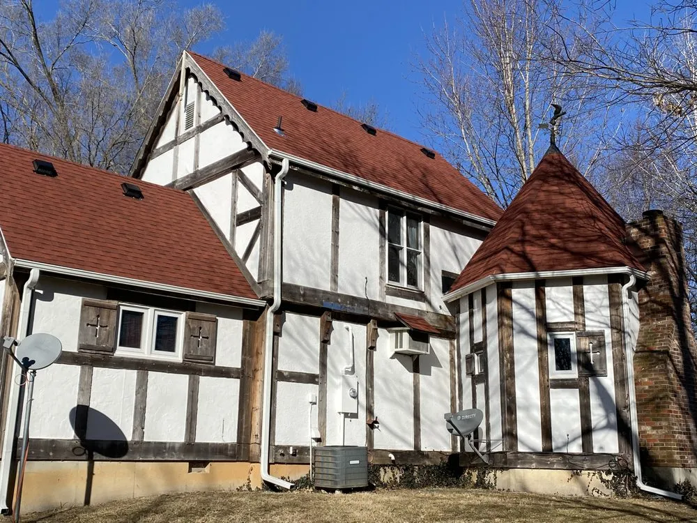 Slide of KC Quality Exteriors