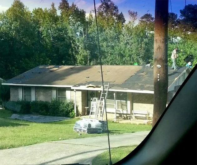 Slide of KC Roofing and Construction