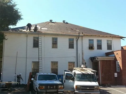 KC Roofing and Construction Logo