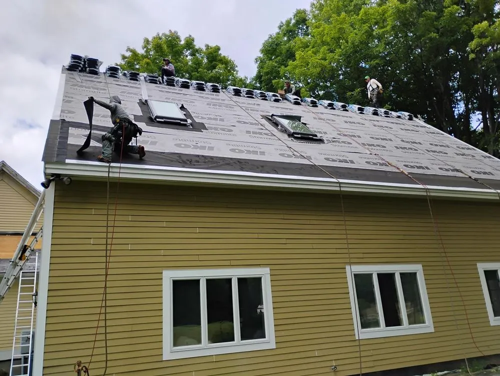 Slide of KCM Roofing