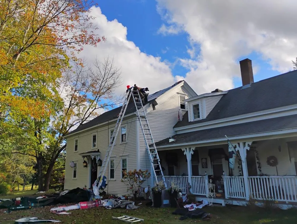 Slide of KCM Roofing