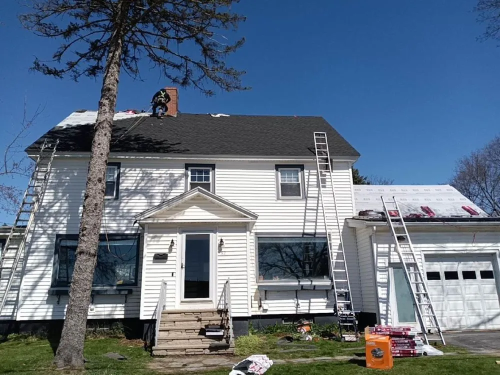 Slide of KCM Roofing