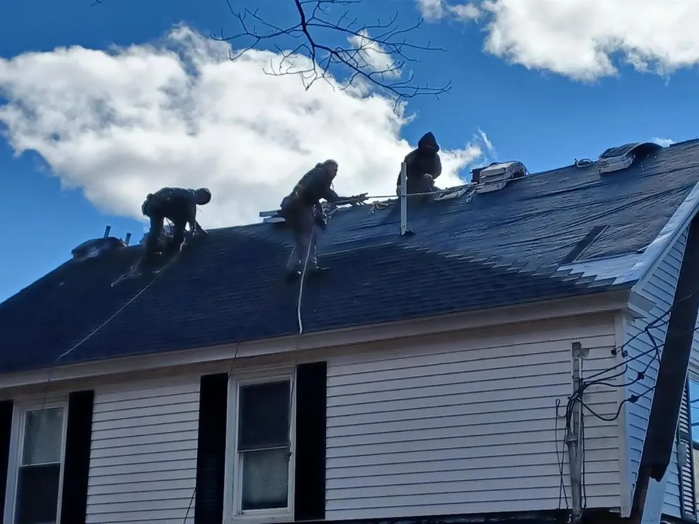 Slide of KCM Roofing